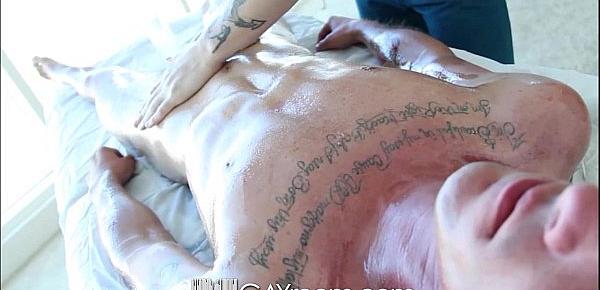  GayRoom Oiled up tattooed guys fuck on the massage table